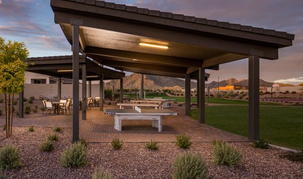 Ping pong tables and outdoor seating with views of the San Tan Mountains