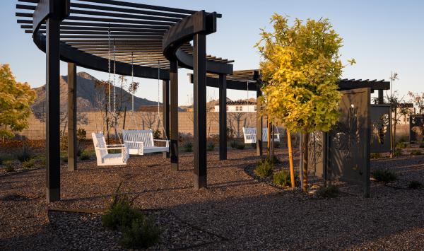 Community swings with views of the mountains and water features